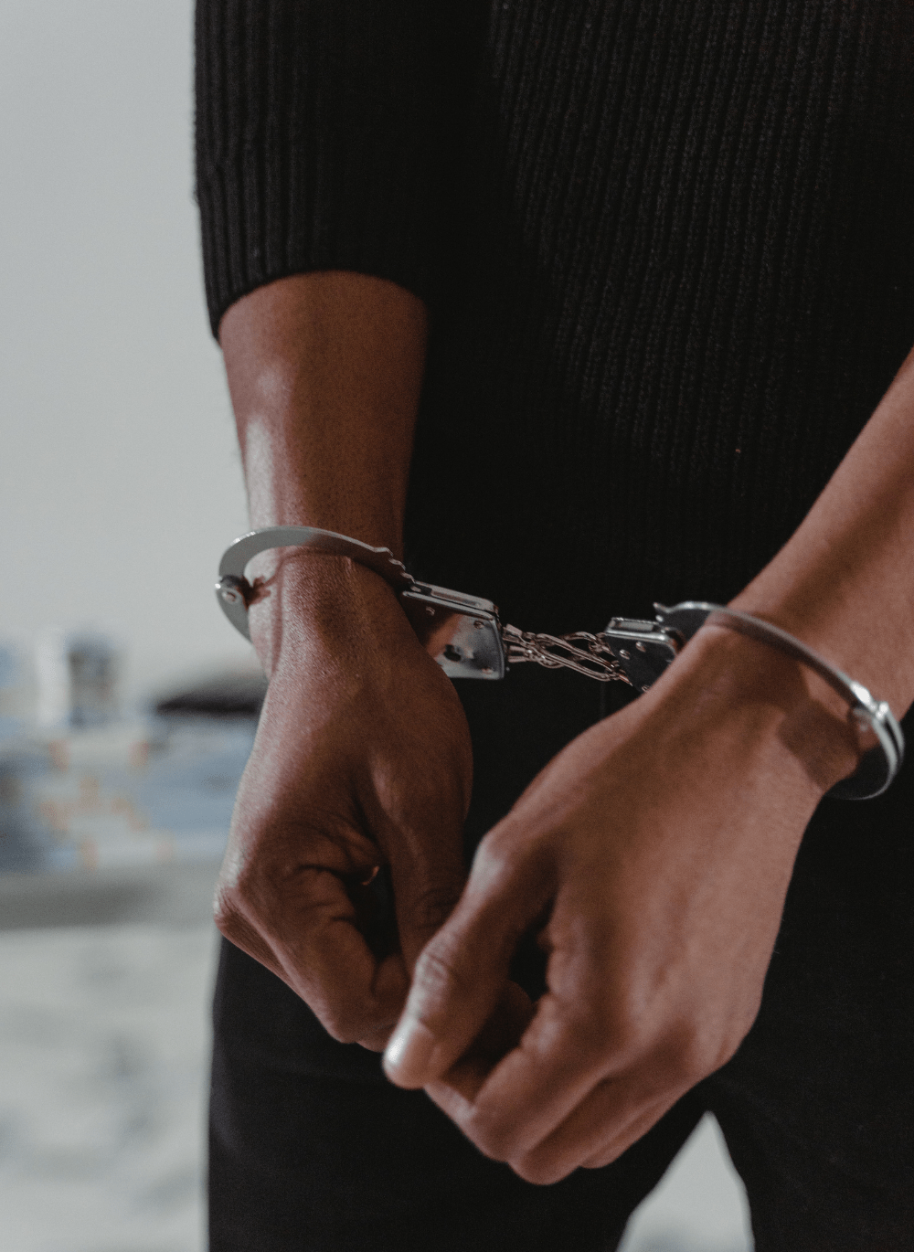 Handcuffed Person _ What Happens if You Are Charged with a Felony 